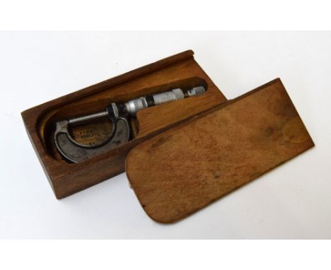 A vintage boxed micrometer made by Moore and Wright of Sheffield in original box