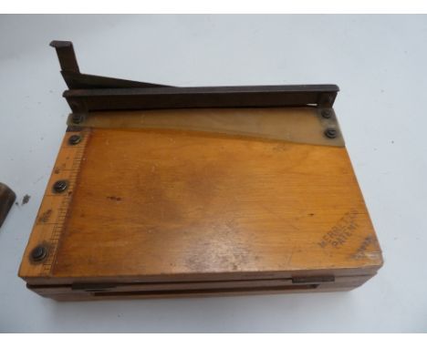 Three vintage guillotines one bearing the mark 'Merretts Patent'