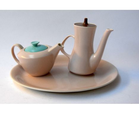 A selection of Poole pottery: a coffee pot with brown lid, a teapot with turquoise lid together with a large serving plate 31