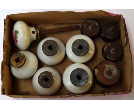 A selection of ten ceramic door knobs, to include four decorated with flowers