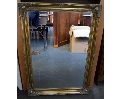 A large framed gilt mirror 110 x 75cm