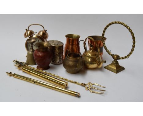 A selection of metal items to include goblets,an alarm clock and a toasting fork amongst others