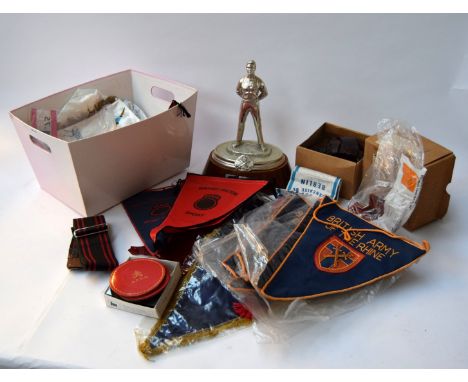 A mixed lot of militaria including various pennants relating to the British Army of the Rhine, a military belt in box, and a 