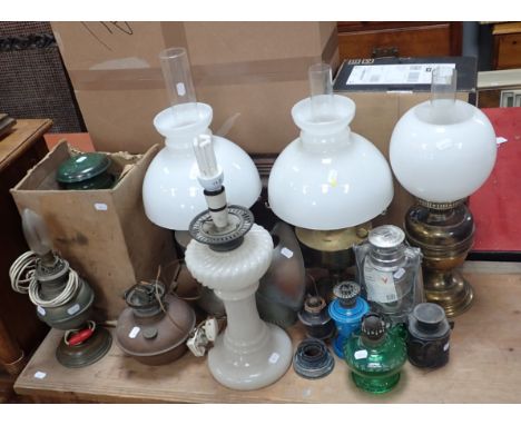 A WHITE MOULDED GLASS OIL LAMP (CONVERTED) a boxed vintage WALLIS &amp; BATES lamp (with instructions), a painted blue glass 