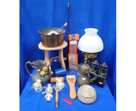A COPPER PAN AND AN OIL LAMP with accessories and a small carved stool, with a collection of domestic items