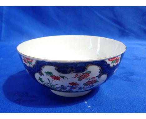 WORCESTER BLUE SCALE GROUND BOWL with reserved rococo panels, with pseudo Chinese mark, c1770, 15 cms diam