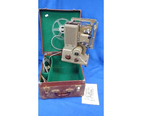 A VINTAGE 'SPECTO 500' CINE PROJECTOR cased, with instructions