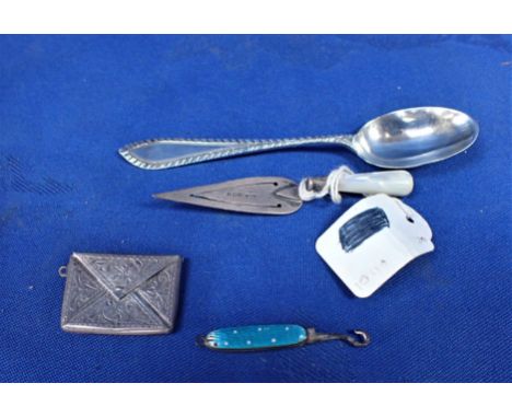 A SILVER 'TROWEL' BOOK MARK AND A SILVER SPOON with a sterling stamp holder and a miniature button hook