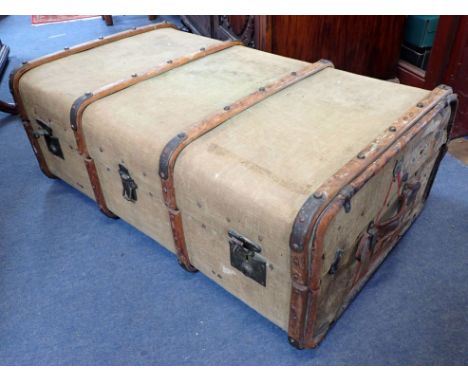 A VINTAGE 'ORIENT MAKE' TRAVELLING TRUNK canvas and wood bound 93cm wide