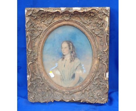 PORTRAIT OF A YOUNG LADY watercolour, 19th century in gilt frame with oval aperture 35 x 40cm