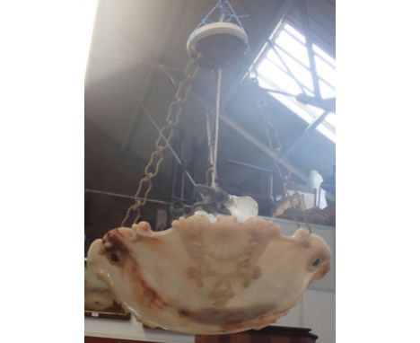 A LARGE 1920S ALABASTER CEILING LIGHT BOWL carved with Rococo shell design, with chain, ceiling rose and fitting 74cm drop, 5