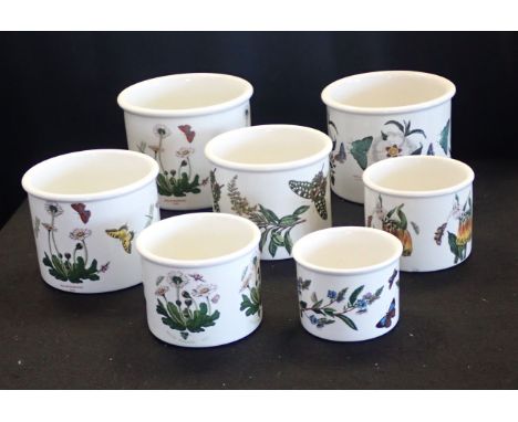 A COLLECTION OF PORTMEIRION PLANT POT HOLDERS various sizes (7)