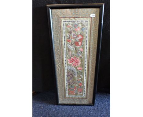 AN EMBROIDERED CHINESE PANEL depicting bird and a frog, glazed and framed