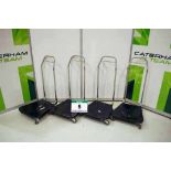 Four Stainless Steel Tyre Movers each complete with Plastic Platform