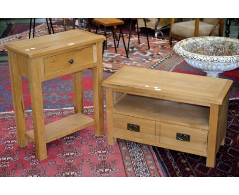 A contemporary light oak side table , single drawer to frieze; a contemporary light oak occasional table, rectangular top, un