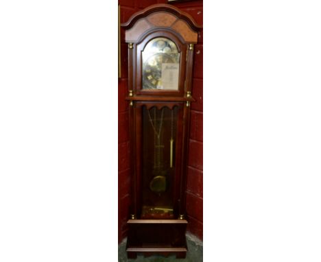 A reproduction Bentima long case clock with battery powered quartz  movement.