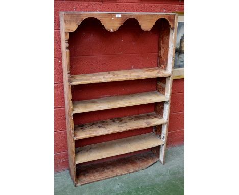 A rustic pine five tier shelf unit. 154cm high x 98cm wide x 24cm deep.