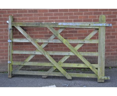 A wooden crossing gate. 133cm high x 200cm long.