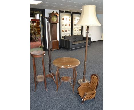 A late Victorian child's button back armchair; a Regency style mahogany torchere, fluted and reeded column, tripod base.; a 1