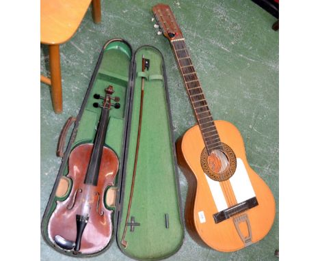 A Madistone violin, two piece back, line purfling, 35cm length, cased with bow; a Spanish Guitarras six string acoustic guita