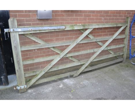 A wooden crossing gate. 133cm high x 300cm long.