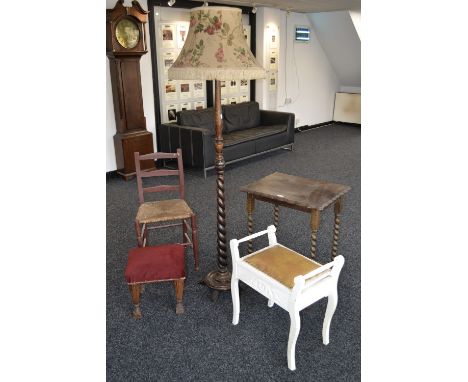 An Edwardian painted mahogany piano stool, a 1940's oak standard lamp, baluster and barleytwist column, circular base; a Rege