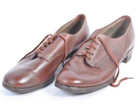 A pair of original 1940's WWII Second World War brown leather shoes from the Women's Land Army. The hard wearing grained leat