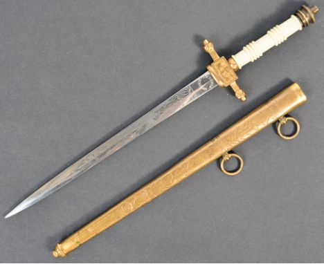 An early 20th Century Dutch Naval Dirk / Dagger / Ponjaard. Having a brass pommel, ivory coloured ribbed handle and an anchor