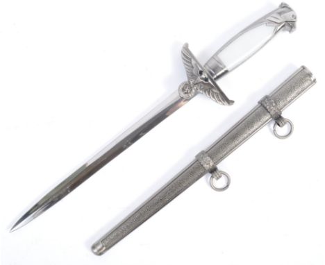 A replica WWII Second World War Third Reich Nazi German Officers dress dagger. Having an eagle head to the pommel and white f