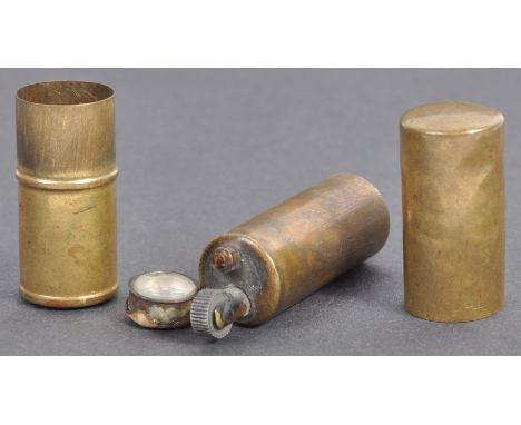 An original WWII Second World War believed RAF Royal Air Force issue miniature cigarette lighter, with hidden compass to base