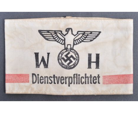 An original WWII Second World War Third Reich Nazi German party cloth arm band. The white cloth armband depicts German Army e