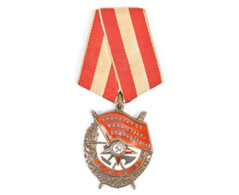 An original WWII Second World War era Russian ' Order Of The Red Banner ' medal. Red and white enamel, with hammer and sickle