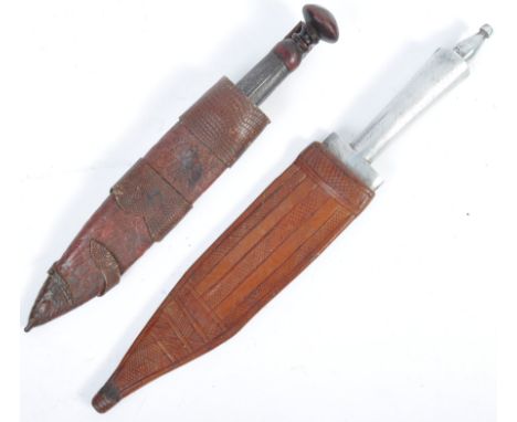 Two 20th century Eastern European and Syrian knife / daggers with scabbards. The Syrian dagger believed WWII Second World War