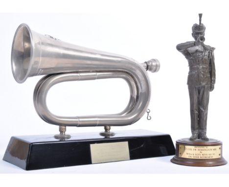 A 20th century Somerset Light Infantry presentation military bugle, mounted on a stand, with plaque to front which reads ' Pr