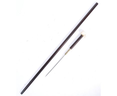 An incredible antique 19th century Victorian sword stick / walking stick cane. The top having a carved ivory knop in the form
