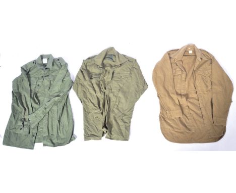 A collection of original vintage British Army WWII Second World War and post-war uniform items to include; a camouflage net, 