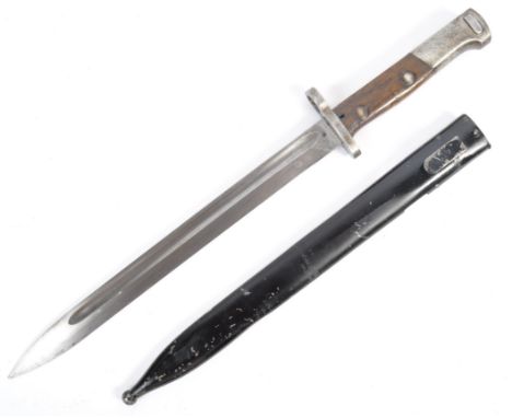 An original WWII Second World War Nazi German era Mauser / K98 rifle bayonet dagger. Having a steel pommel with push release 