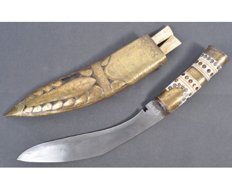 A mid 19th century antique Nepalese&nbsp;Gurkha Kukri knife / sword. The traditional knife having a shaped bone handle with d