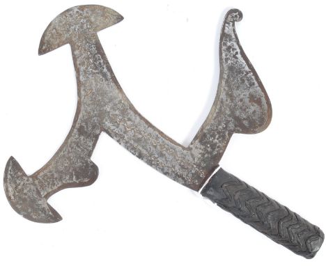 A 20th Century antique African Mambele / Kpinga throwing knife / axe having a shaped blade with two appendages coming from th