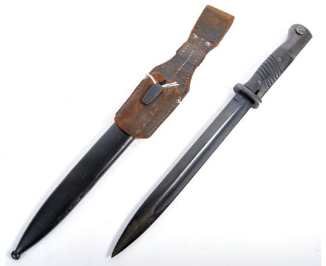 An original WWII Second World War German Nazi Third Reich SG 84/98 rifle bayonet. Having ribbed grips and steel short-hooked 