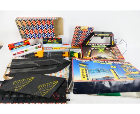 Scalextric - A small group of boxed vintage Scalextric building / accessories with some loose accessories. Lot includes a Sca