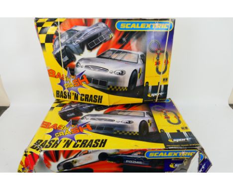 Scalextric - Two boxed Scalextric Bash'N Crash sets. Both sets contain cars and include a quantity of track, controllers and 