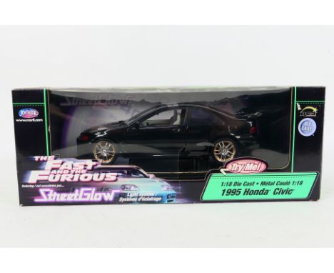 Joyride - The Fast and the Furious. A boxed 1:18 scale #33545 Joyride 'The Fast And The Furious' 1995 Honda Civic. The model 