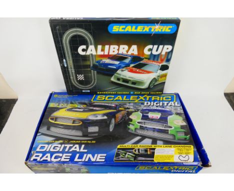 Scalextric - Two boxed Scalextric sets. Lot consists of a 'Calibra Cup' set with two Vauxhall Calibra cars; plus 'Digital Rac