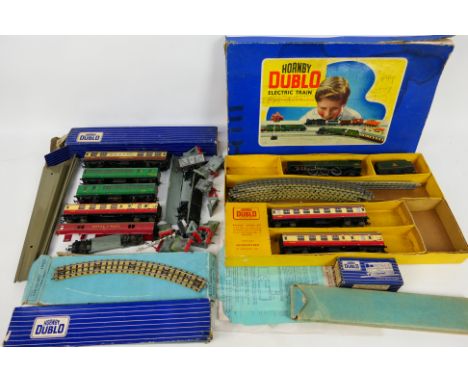 Hornby Dublo - A boxed Hornby Dublo 3-rail Electric Train set with some boxed and unboxed Hornby Dublo accessories. The set i