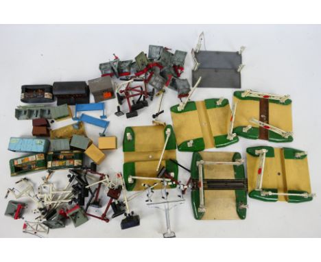 Hornby Dublo - An unboxed collection of Hornby Dublo accessories, including level crossings; signals; platform buildings and 