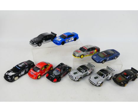 Scalextric - An unboxed group of 10 playworn Scalextric slot cars. Lot includes Jaguar XJ220; Holden VX Commodore; Porsche 91