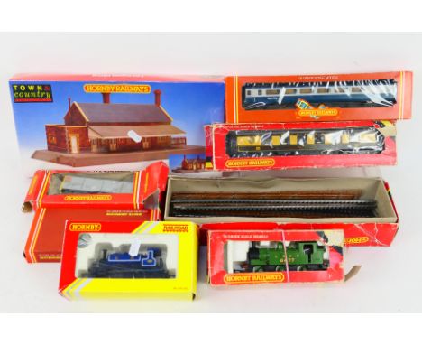 Hornby - Two boxed Hornby OO gauge steam locomotives with a small group of boxed rolling stock, some track and accessories. L