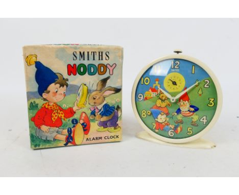 Smiths - Noddy - A boxed 1959 dated Smiths Noddy Alarm Clock. The clock appears unused and in Near Mint condition, the box is