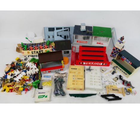 Scalextric - A boxed and unboxed collection of vintage Scalextric accessories and parts. Lot comprises of mainly building par